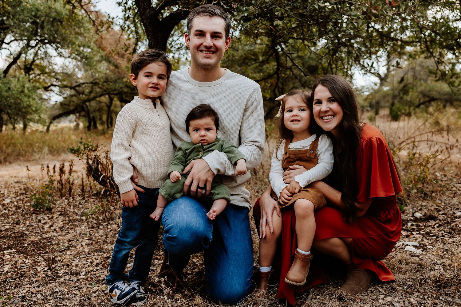 Outdoor Austin family photography featuring playful, authentic family moments with toddlers
