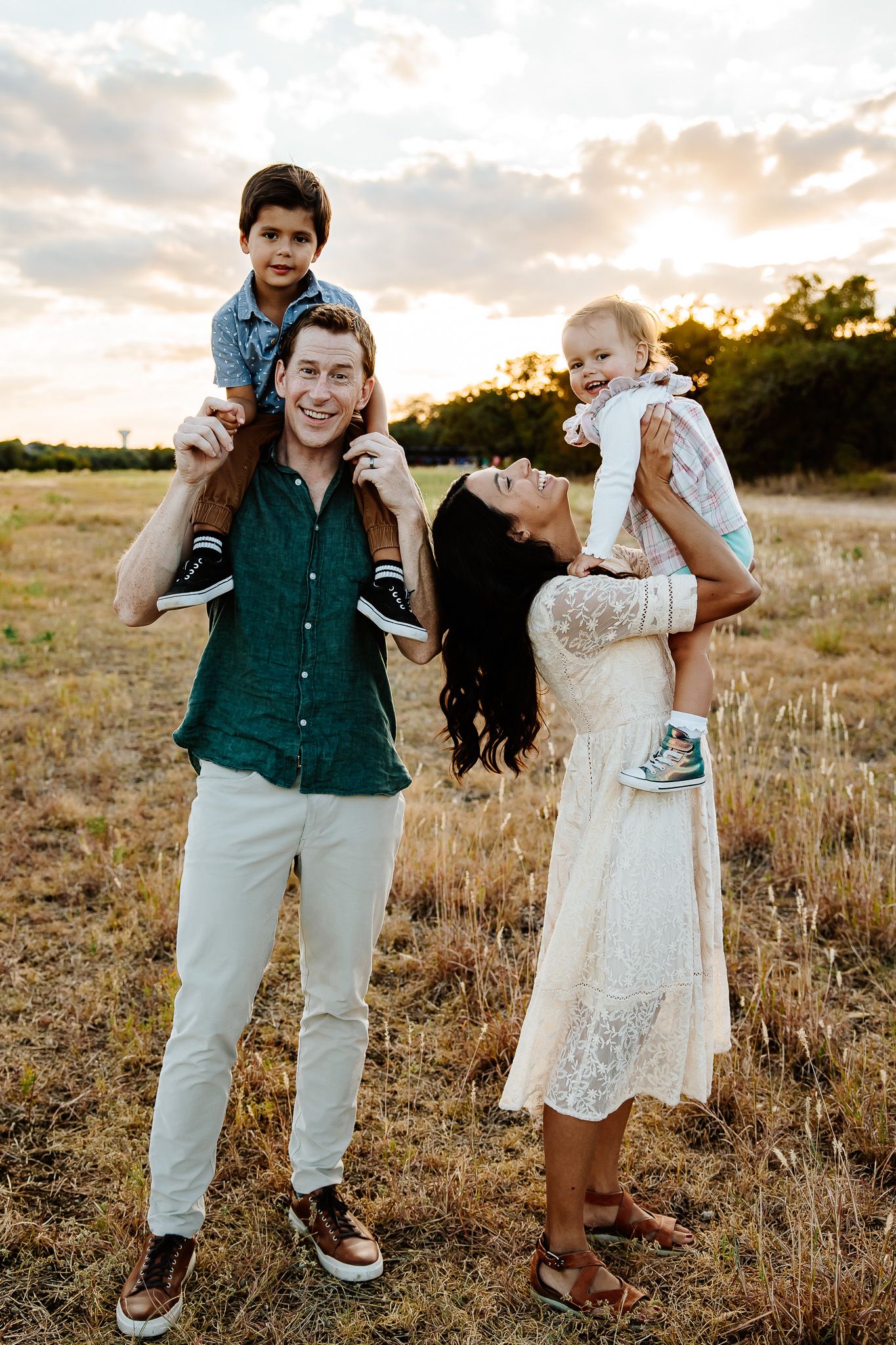Outdoor family photography in Austin, showing parents and toddlers enjoying nature