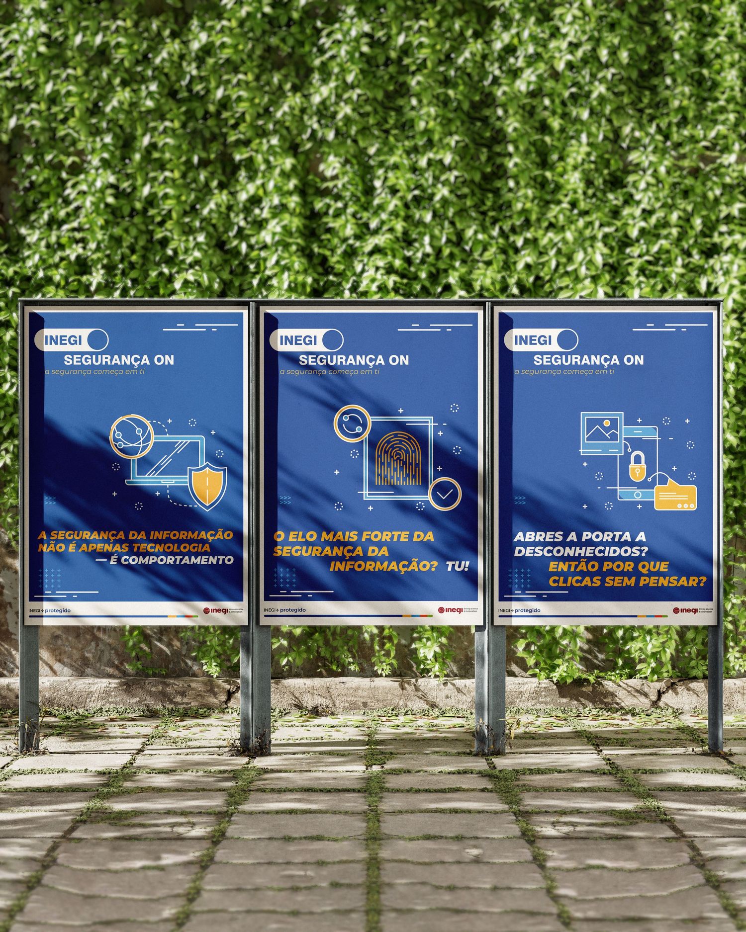 Row of blue informational signs with text mounted against a leafy green hedge background.