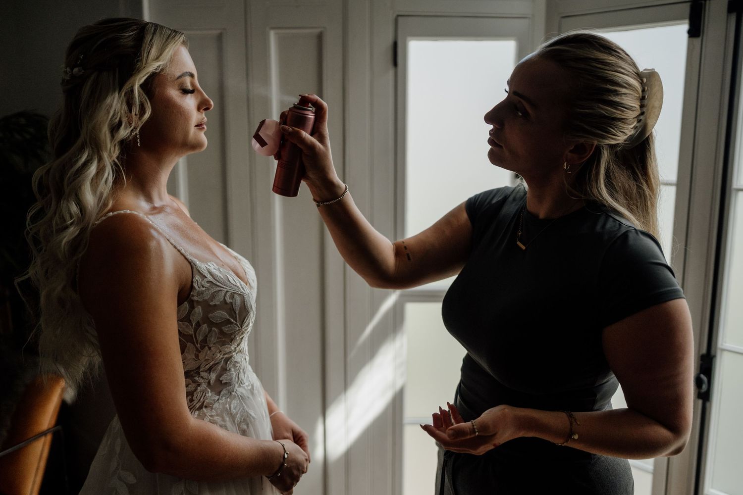 Morning preparation scene with natural window light creating intimate moments.