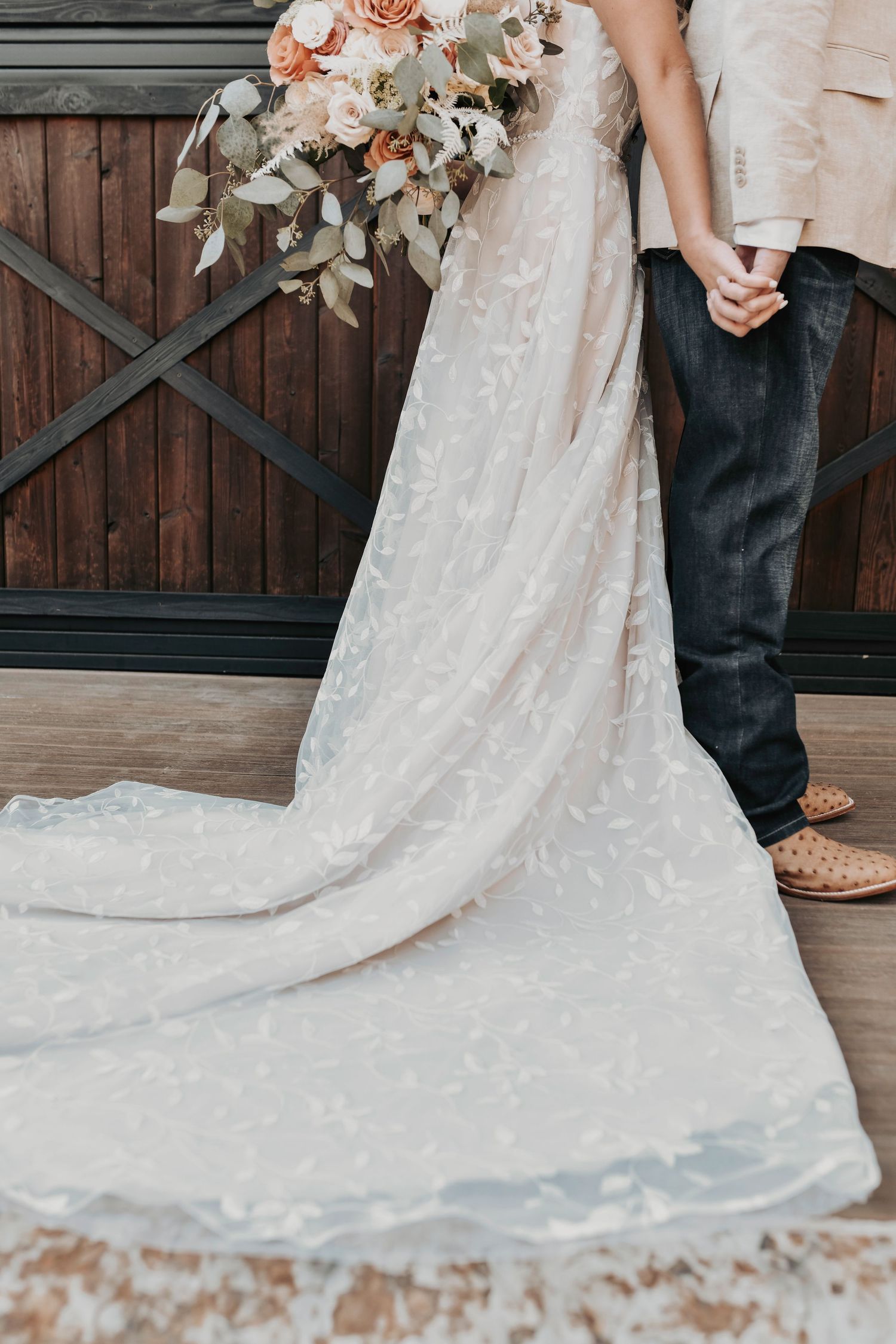 Groom wiping away tears during first touch moment