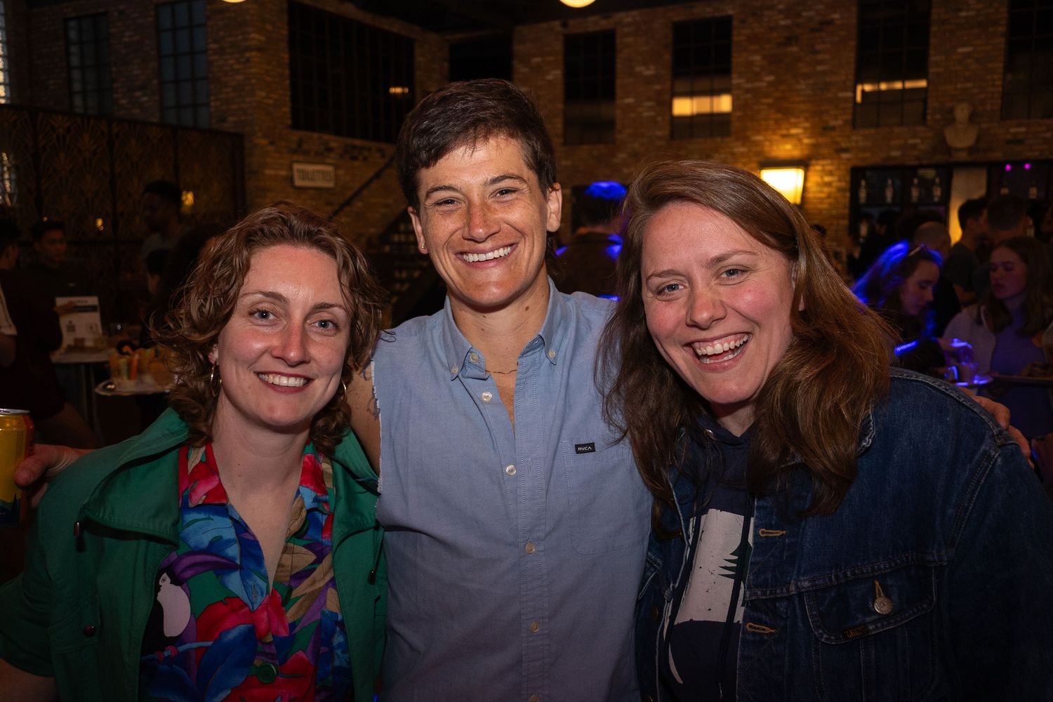 Three friends pose for a photo at the CMSA annual member party