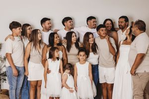 Family photoshoot collage featuring coordinated white and denim outfits against a light background.