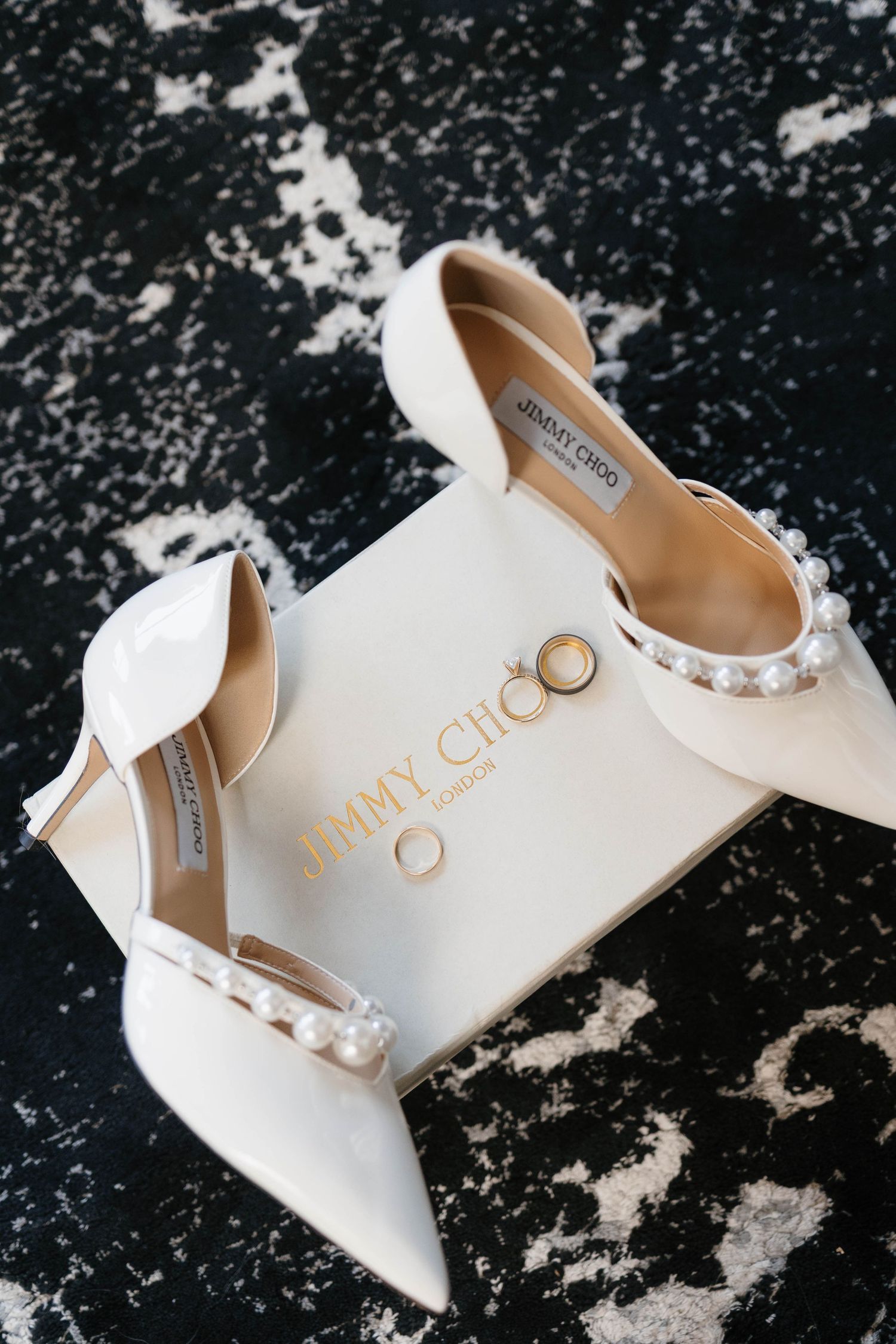 Luxury Jimmy Choo bridal shoes with wedding ring detail shot