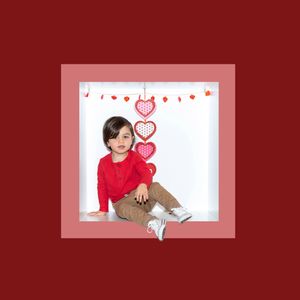 Valentine's Day themed collage with red and pink hearts, showing playful poses against a white backdrop.