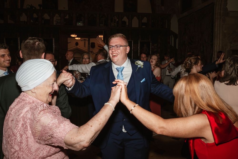 Berkeley Castle wedding venue Gloucestershire medieval castle evening reception main hall candid dancefloor photos