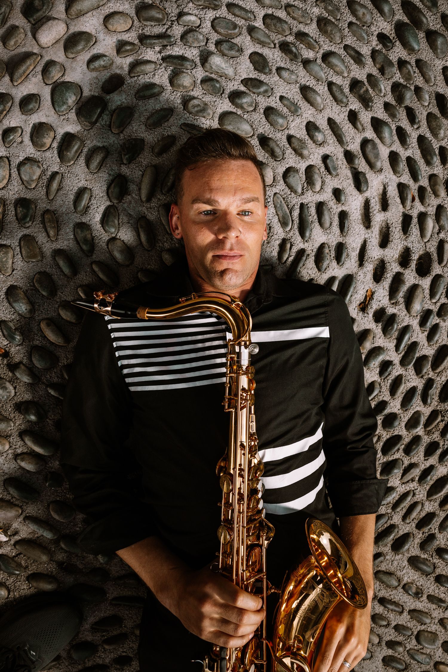 Portrait of a musician posing for his album