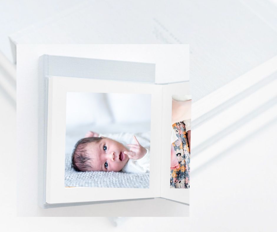 Clean white photo album spread displaying modern portrait photography.