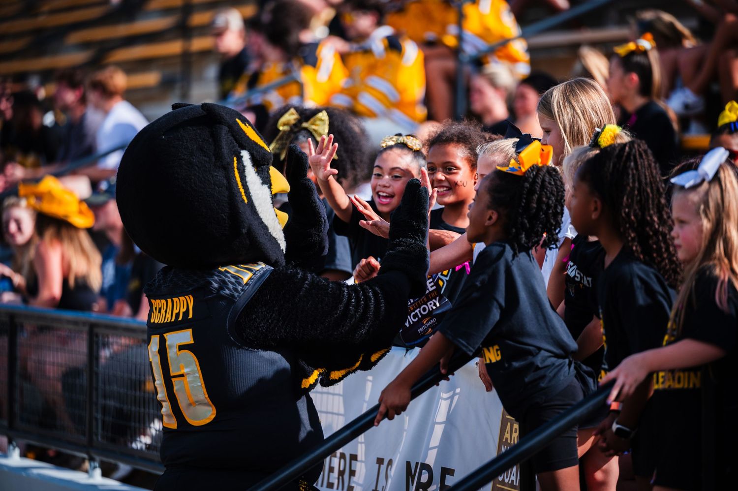 KSU football mascot with kids