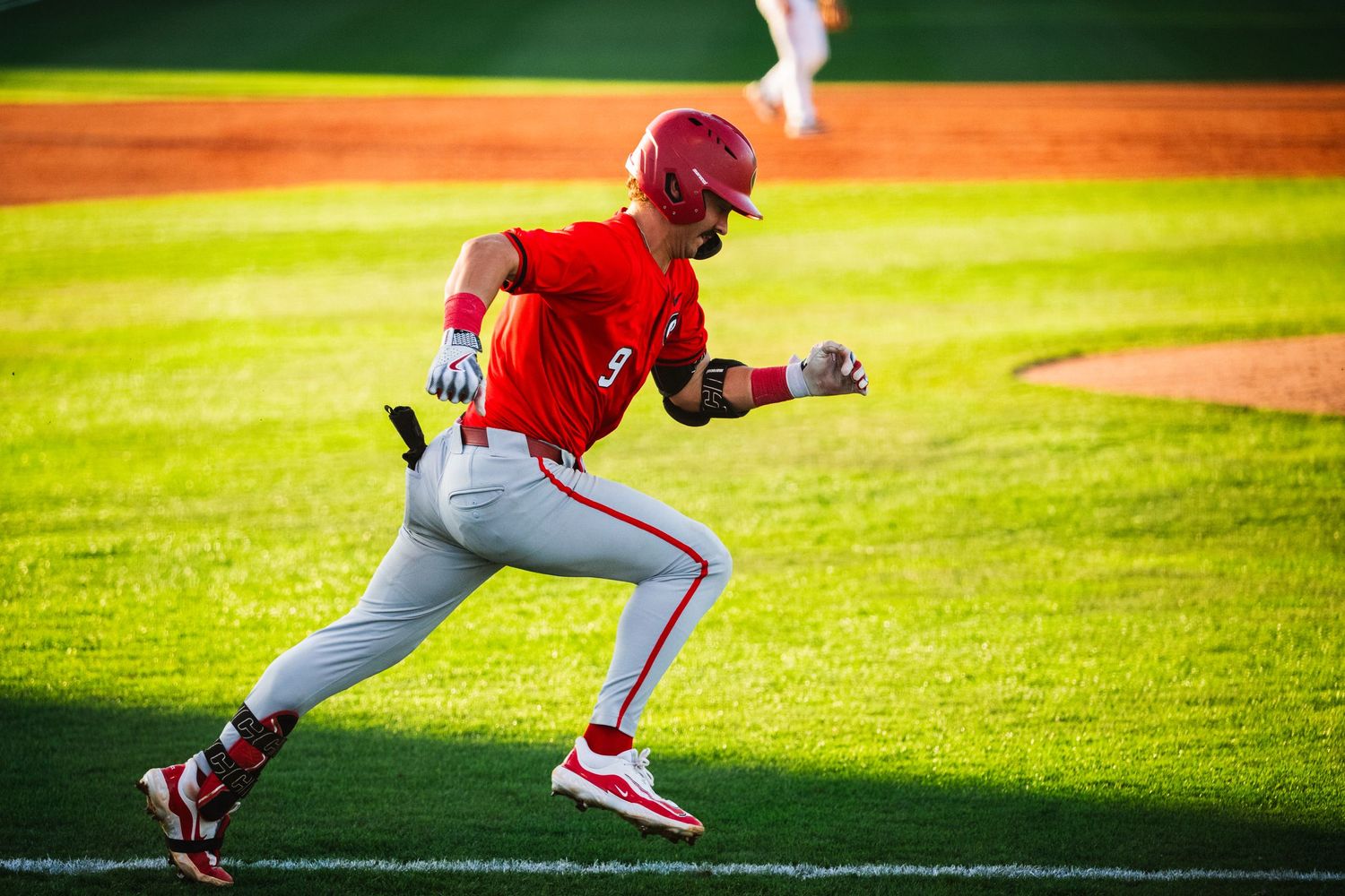 GA baseball player running