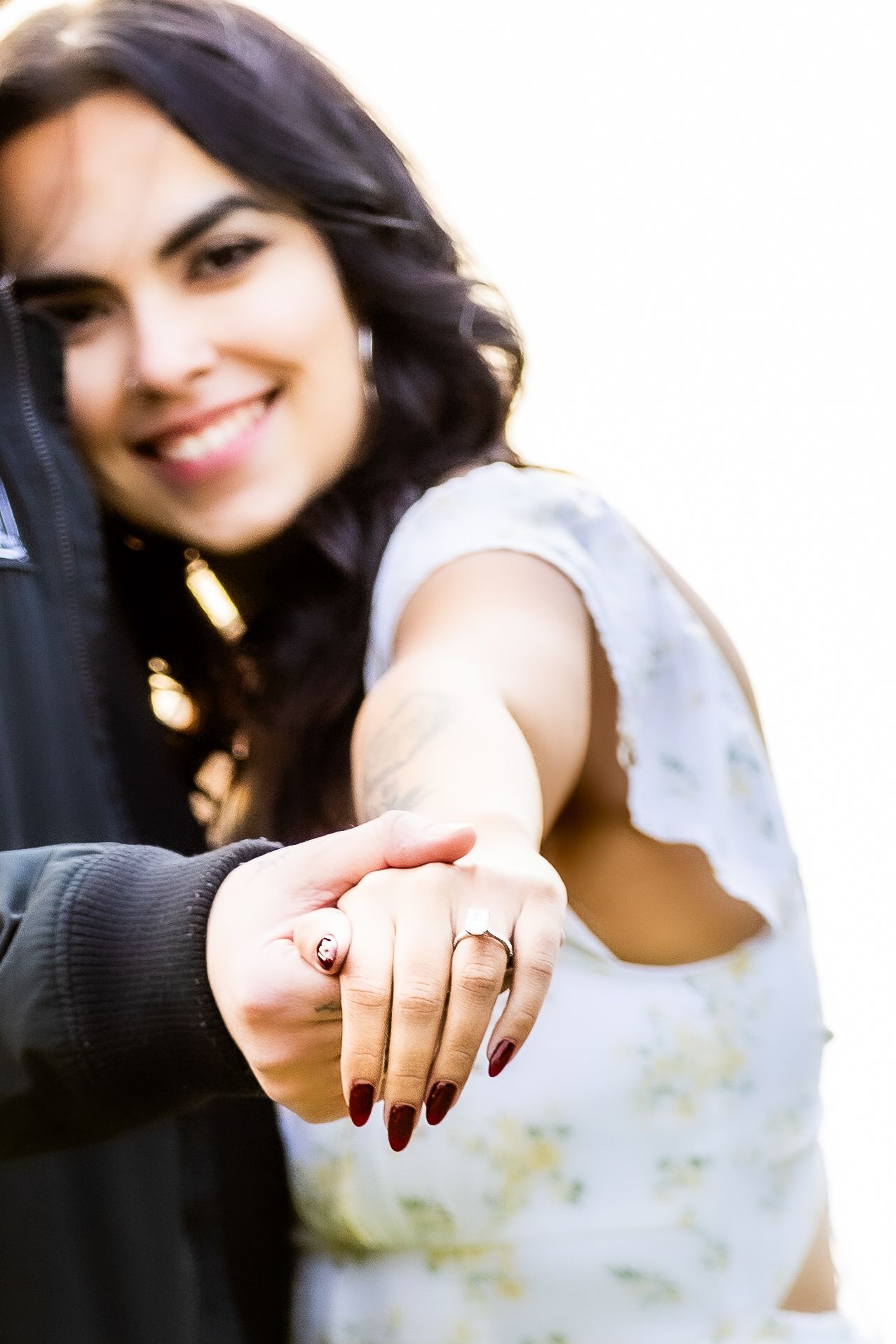 A close-up shot of an engagement ring with a blurred background. Longwood, Florida