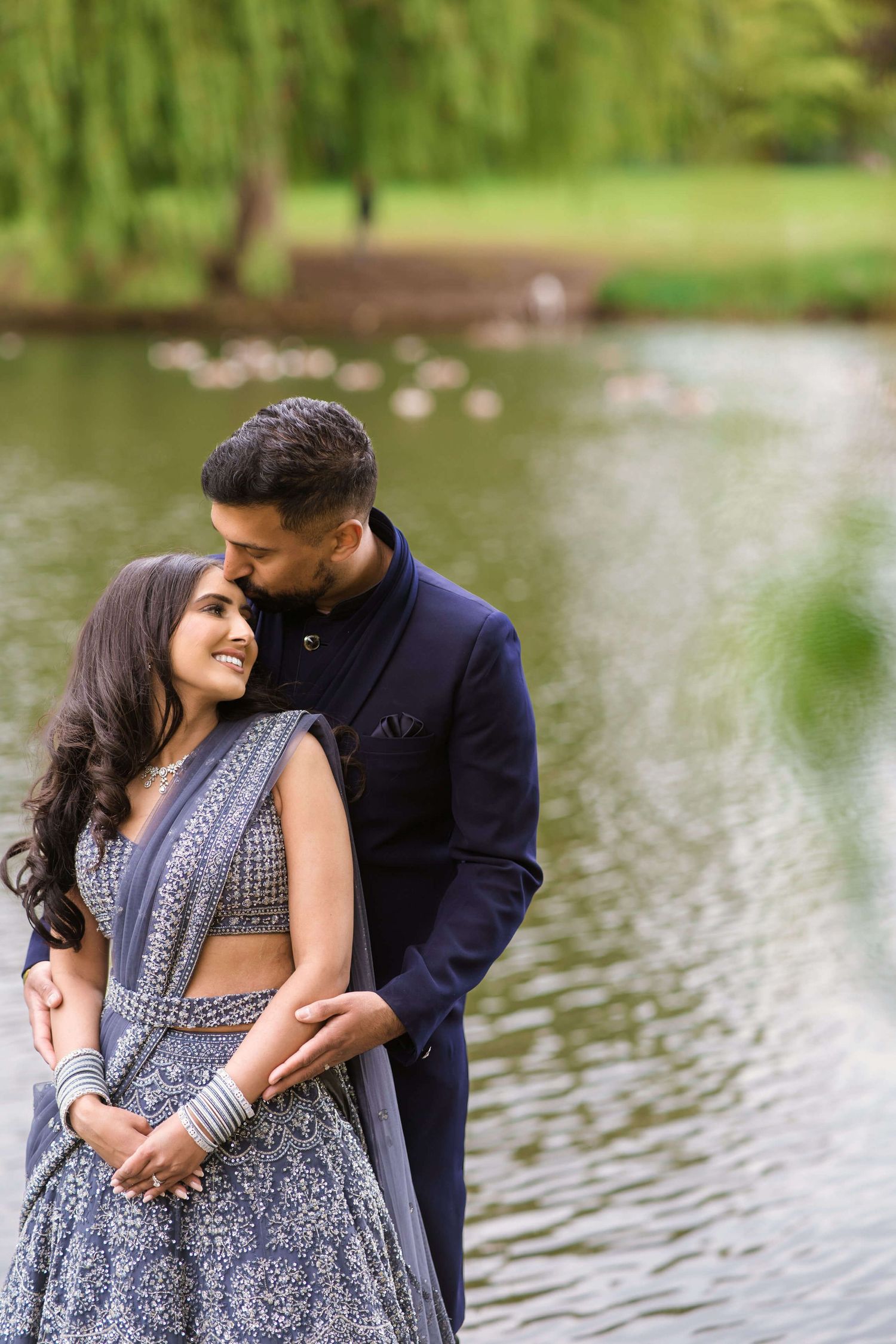 newly weds expressing intimacy after their Anand karaj in london