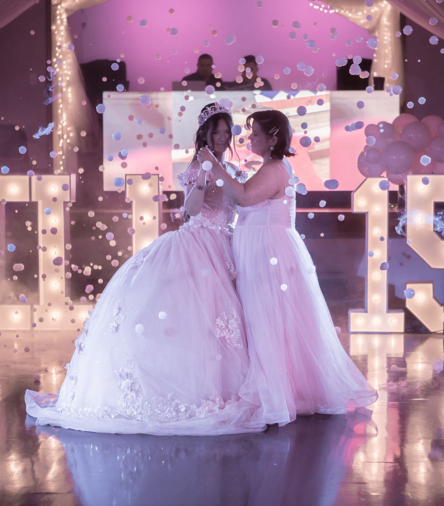 Quinceanera and mom dancing pink theme