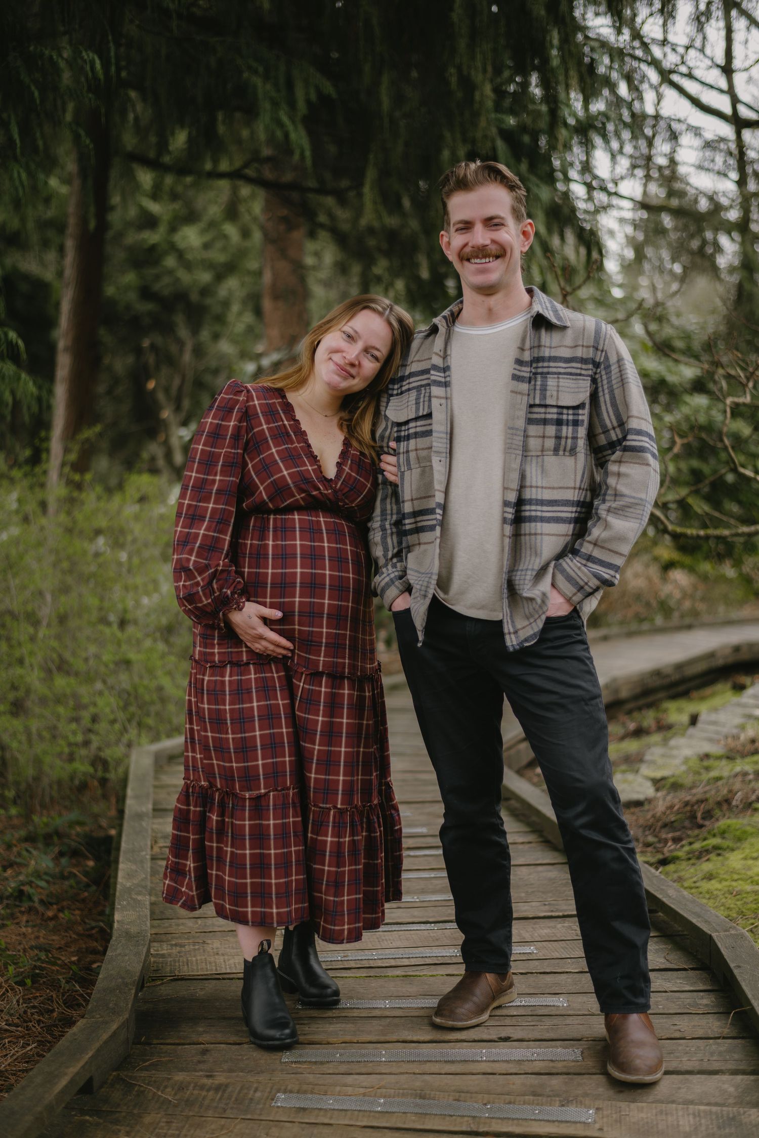 pregnant women and husband beside each other