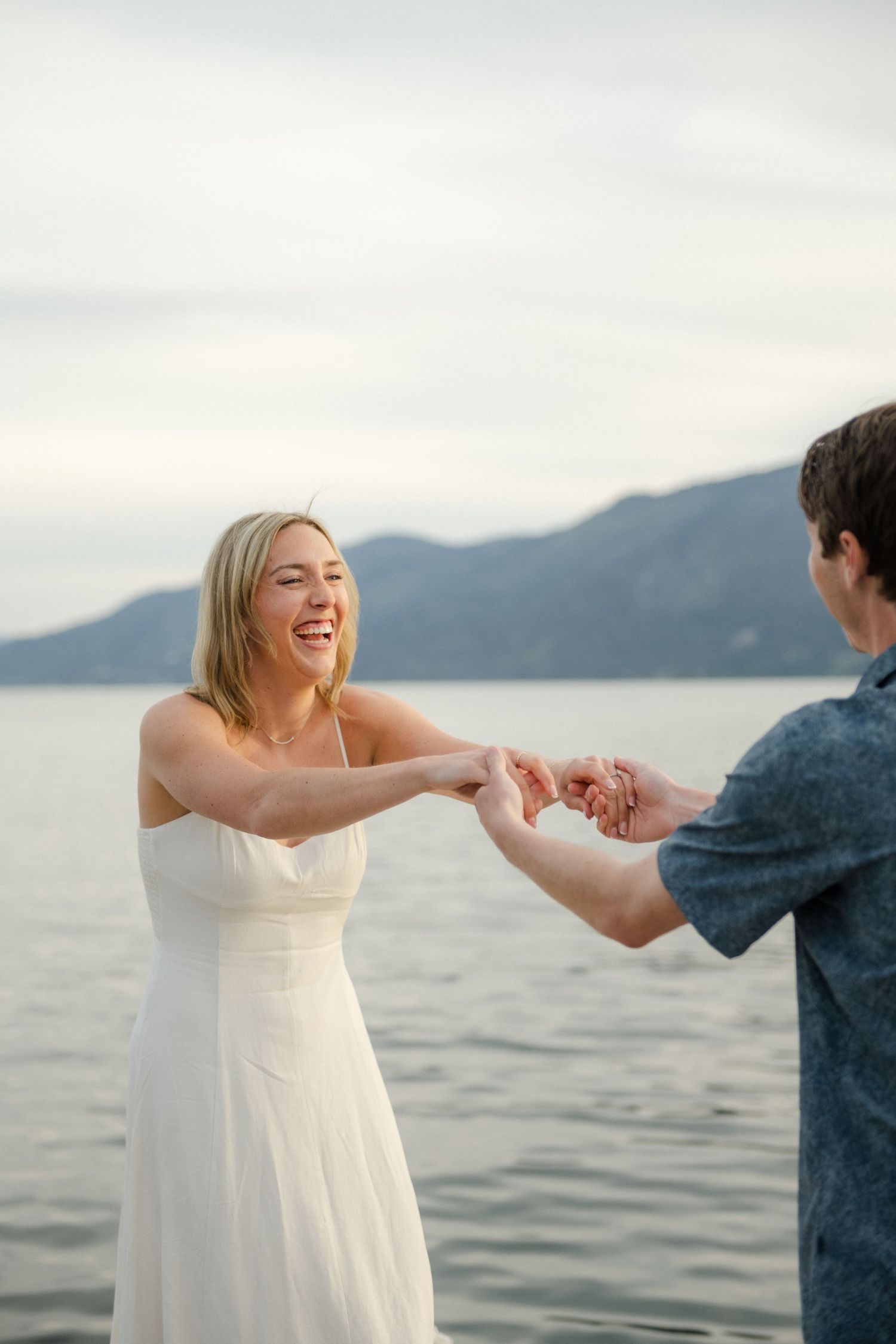 couple dancing in front of Okanagan lake