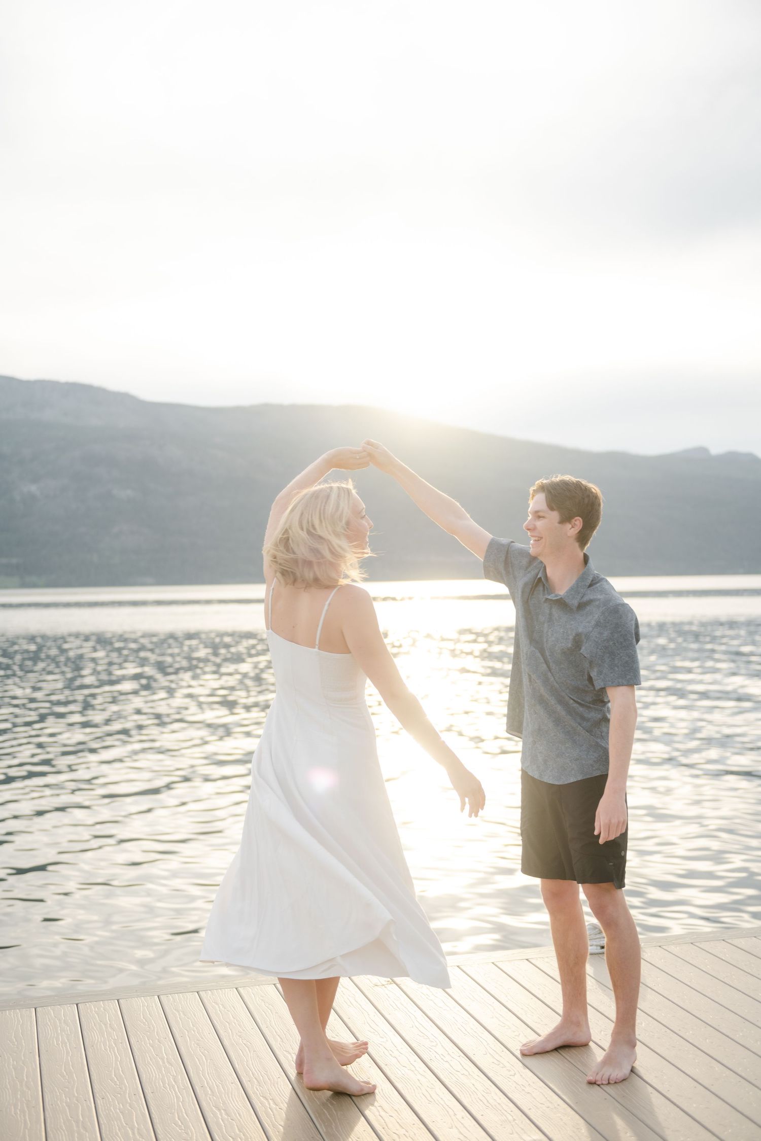 couple dancing in front of Okanagan lake