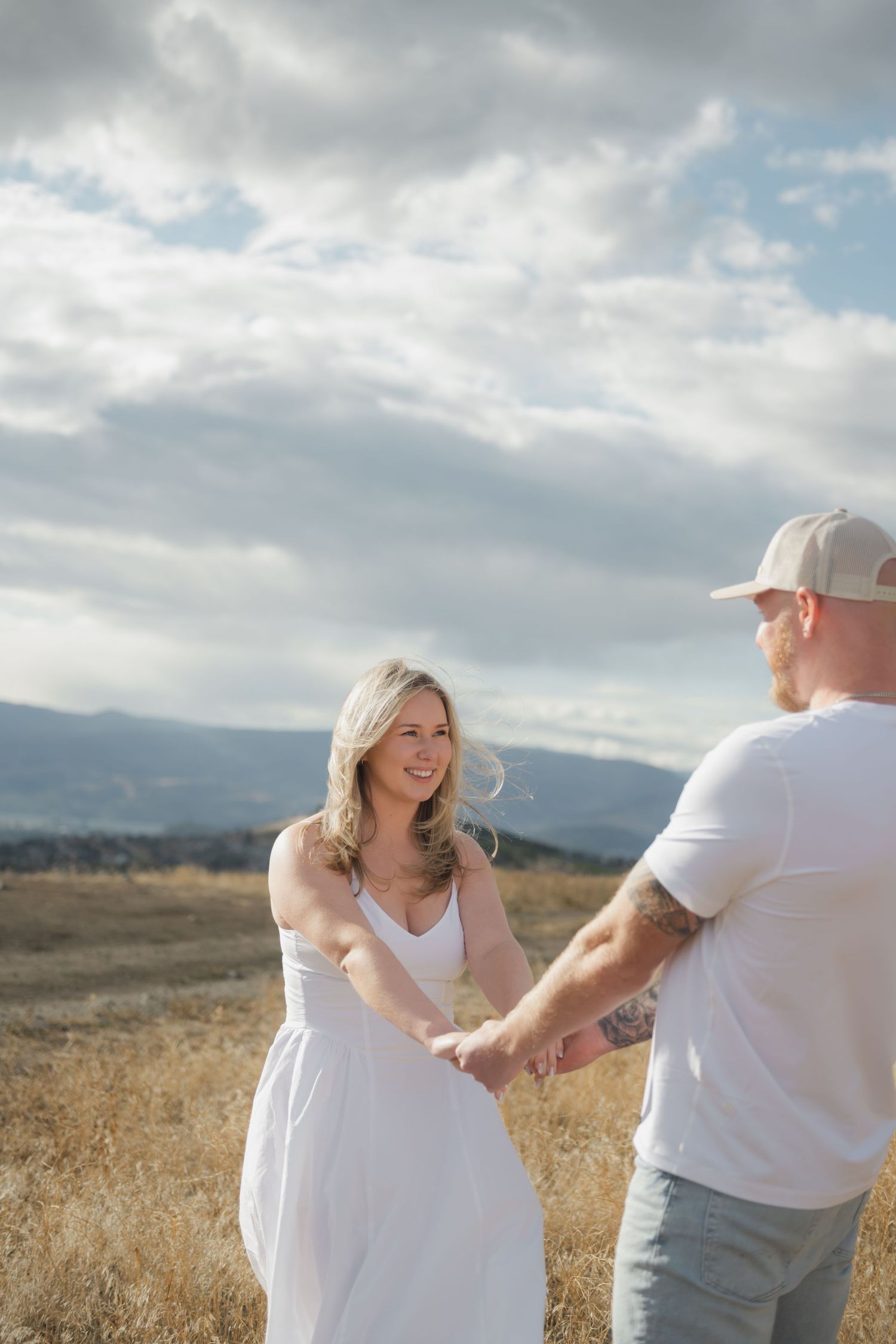 couple dancing outside in the sun