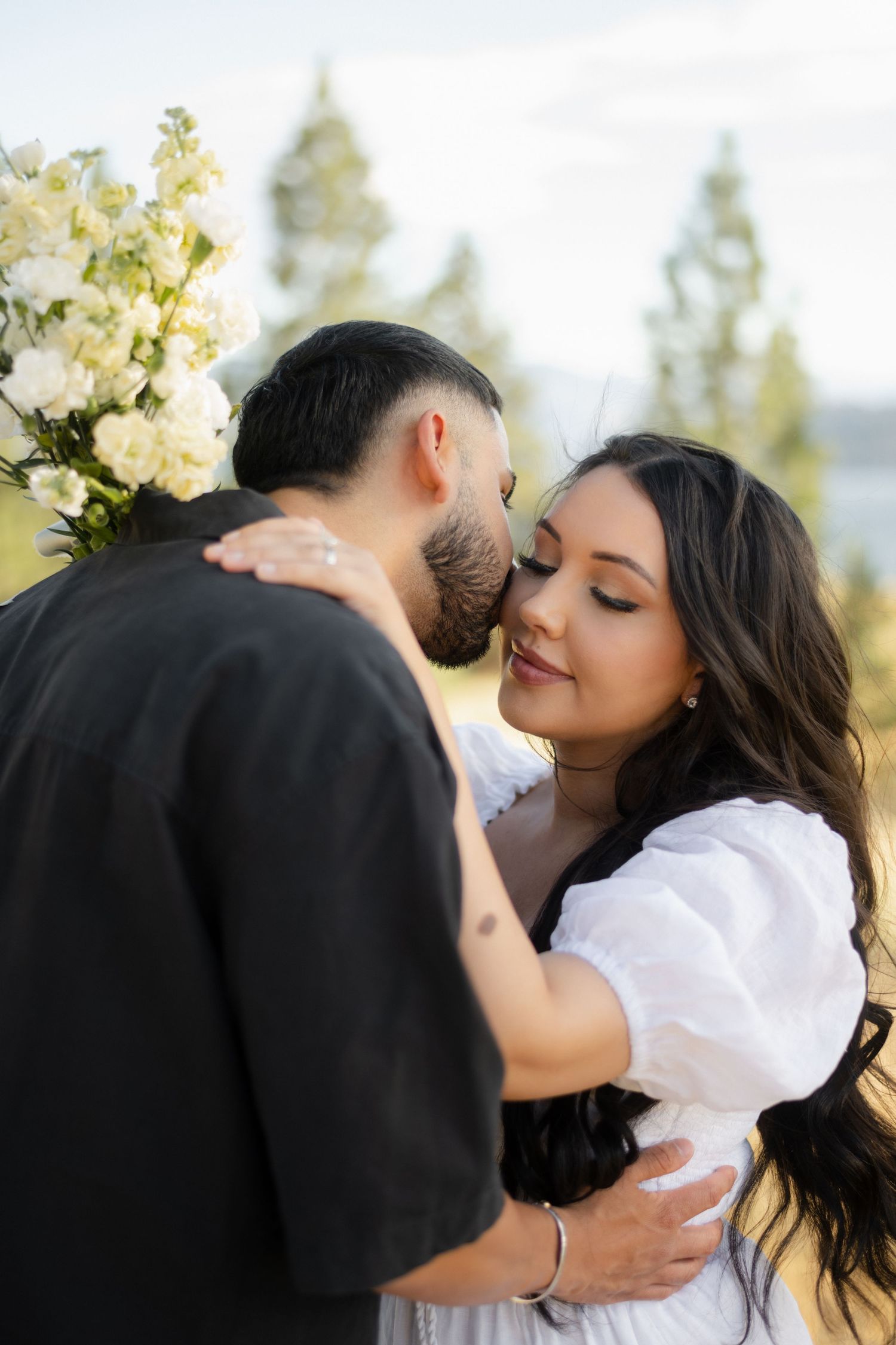 husband and wife dancing outside