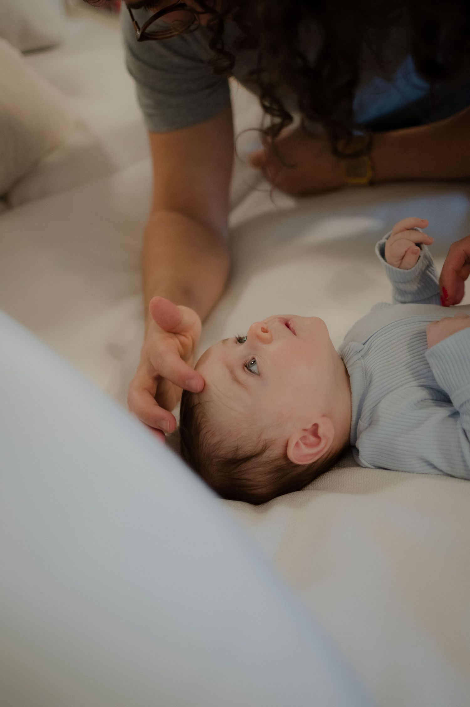 cute baby looking up at its dad
