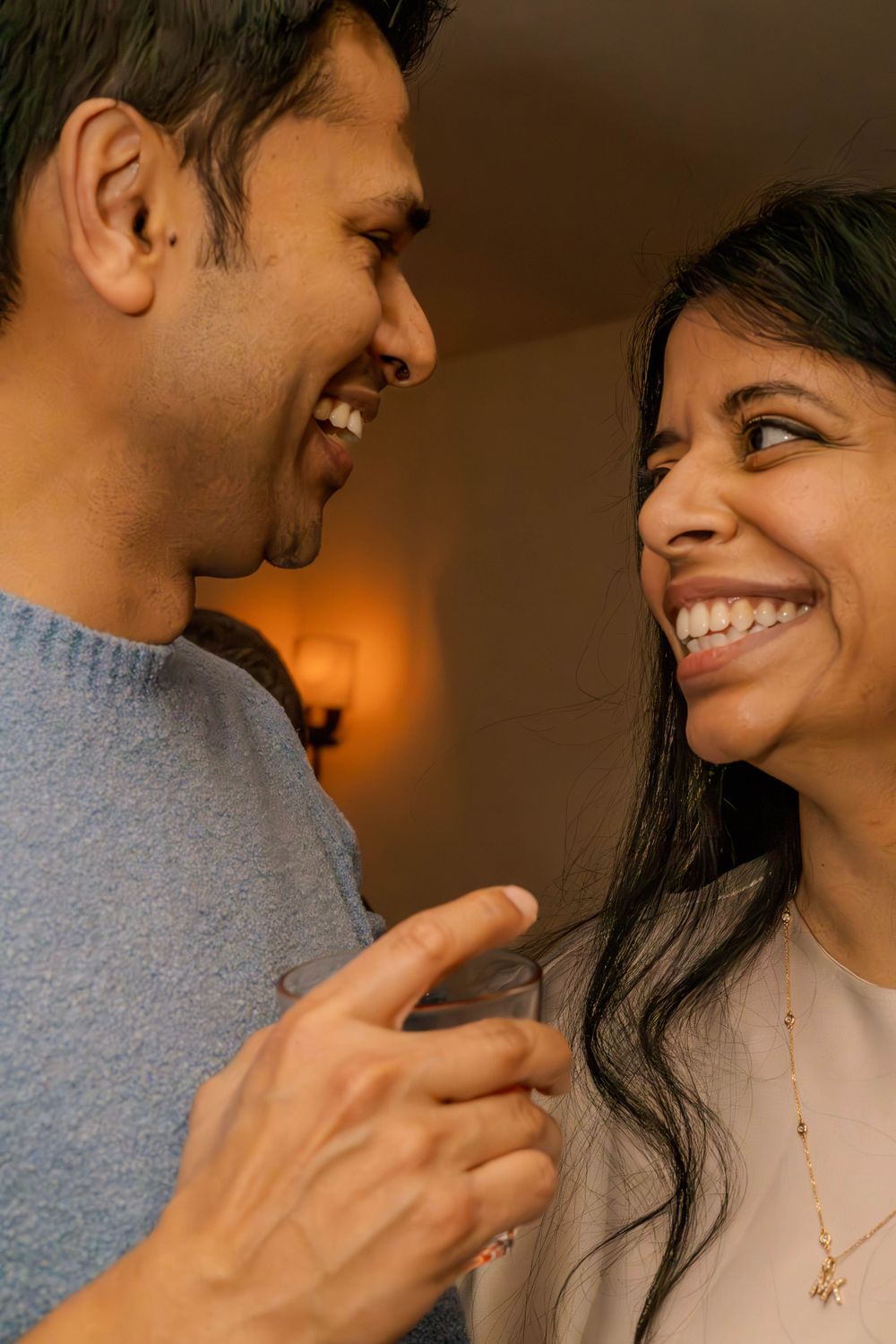 Close-up of a couple sharing an intimate moment with natural, candid expressions.