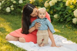 Backyard portrait of Mother and infant son