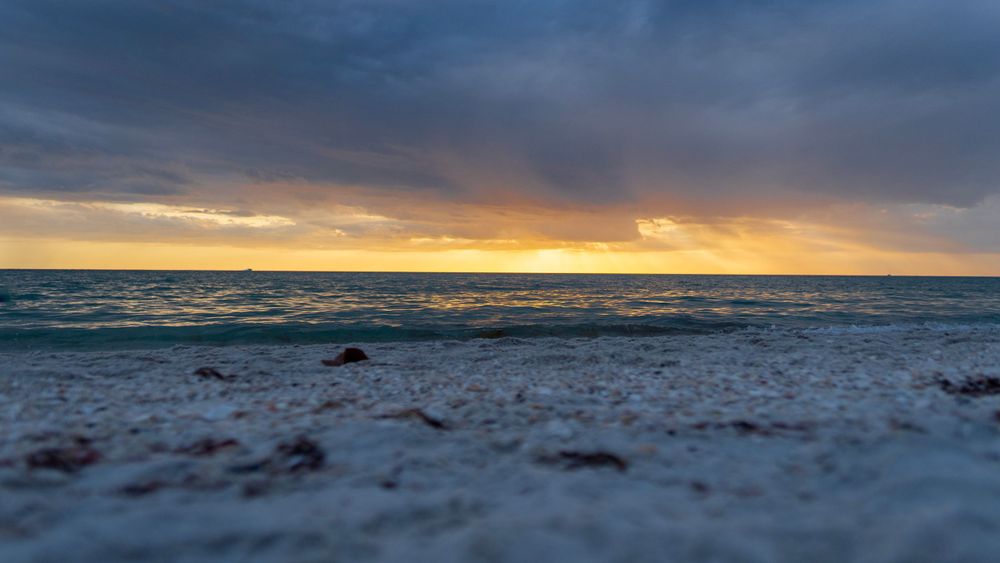 A sunset over a beach