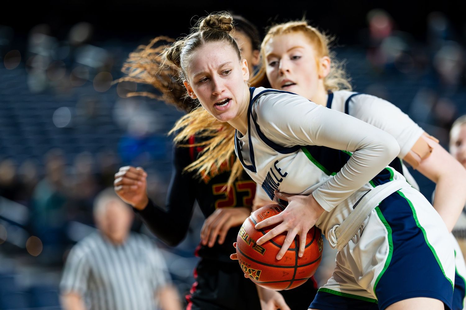 A high school women's basketball player from Woodinville High School.