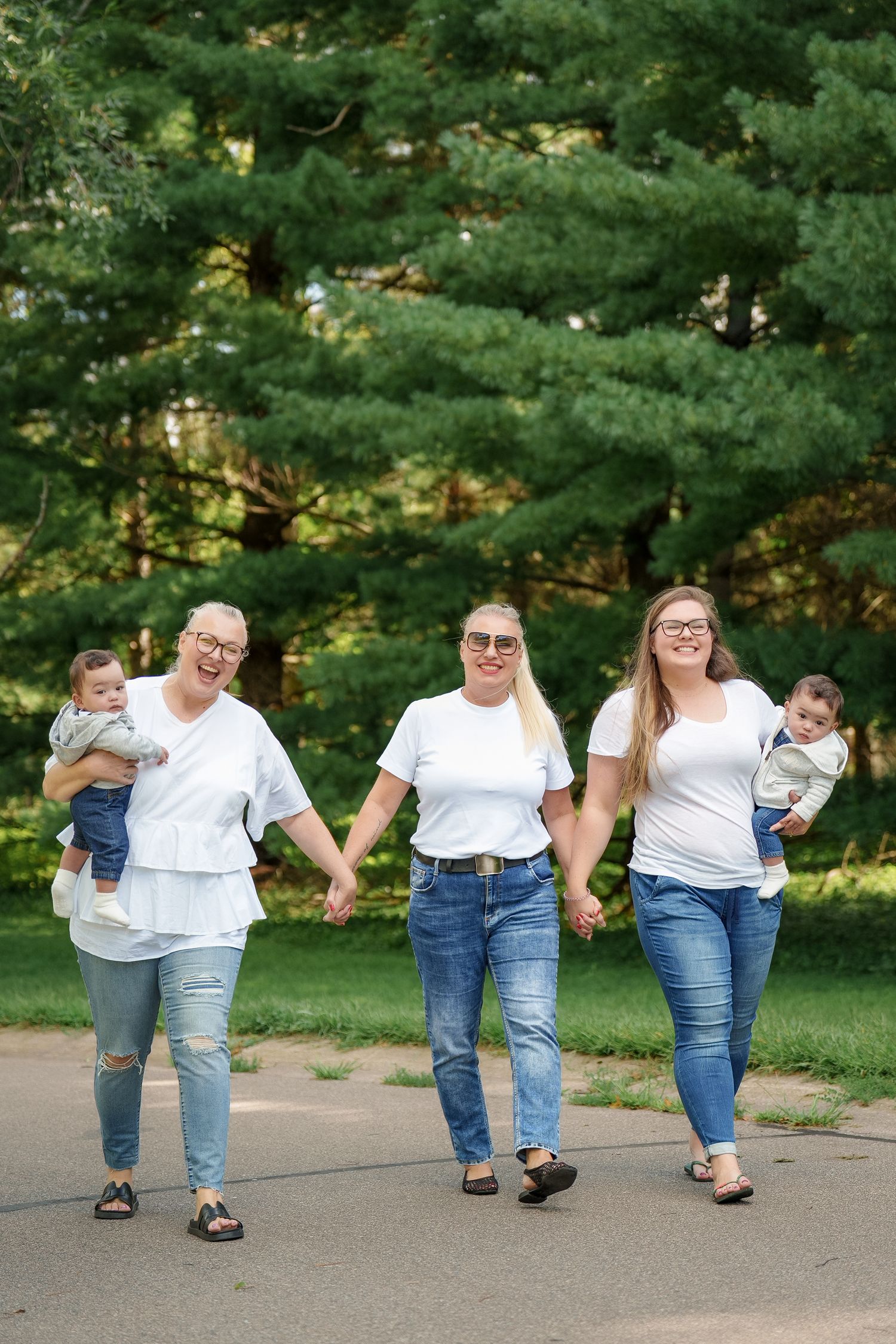 A creative photo sequence showing people in matching white shirts and jeans walking in synchronized poses outdoors.