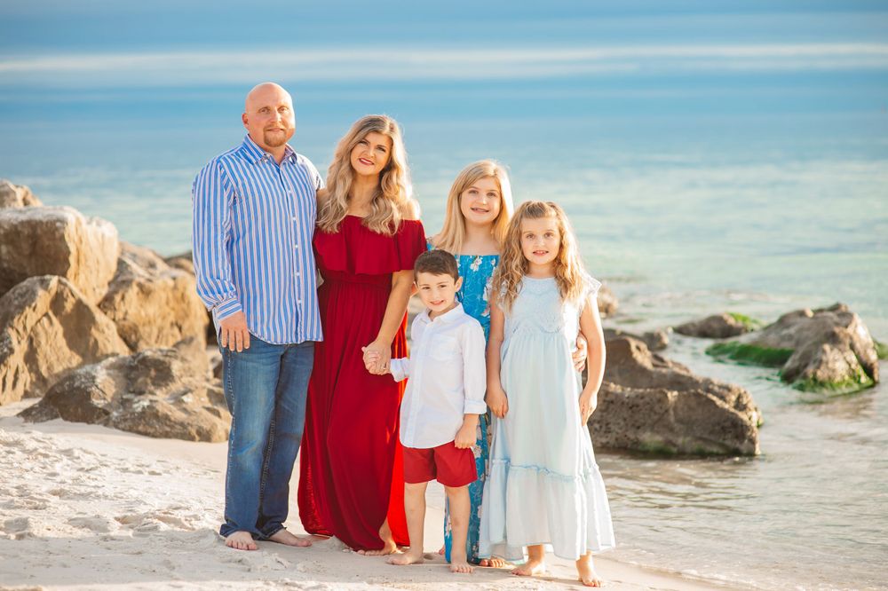 morning beach sesion Orange Beach Alabama by the jetties gulf blue waters family session frame worthy smiles connection