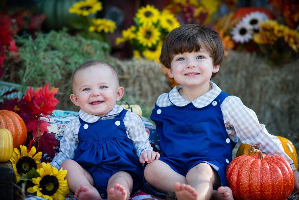 Fall mini session Opp Alabama siblings laugh smile pumpkins sunflowers creative set Natural light
