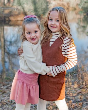 two sisters at at lake