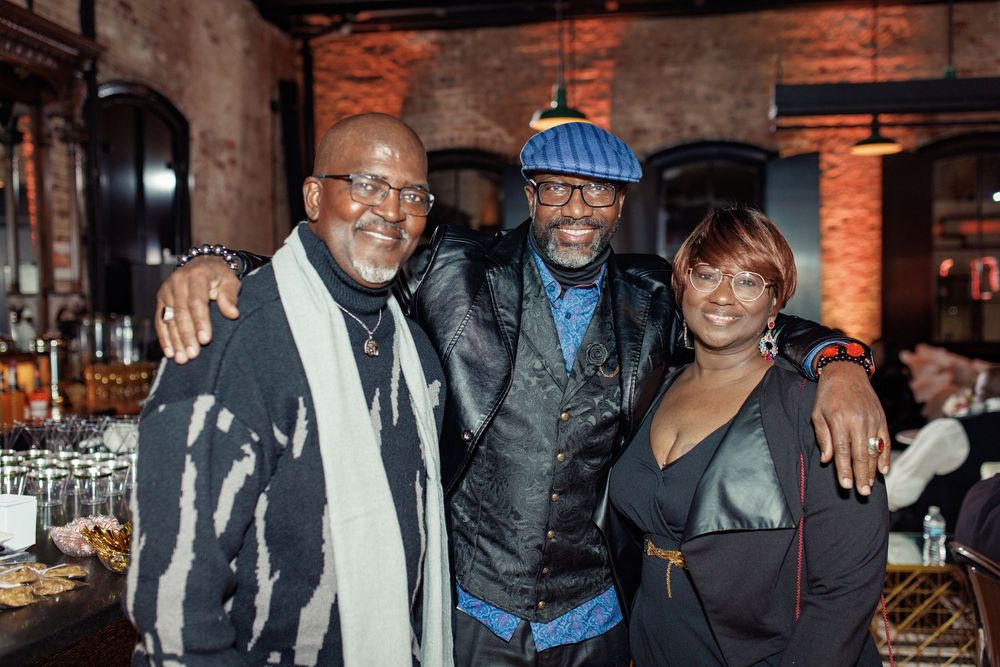 event photography in louisiana. group smiling in camera.