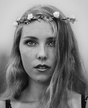 Close-up Portrait of a woman, Outdoor photography. black and white. Fashion photography