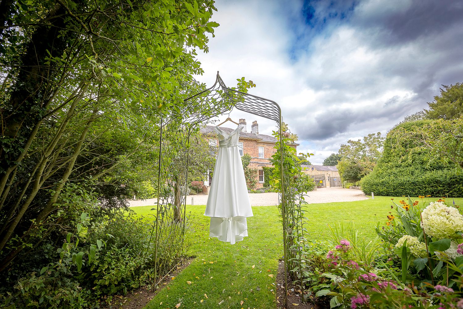 wedding photography shuttle hall dress hanging outside