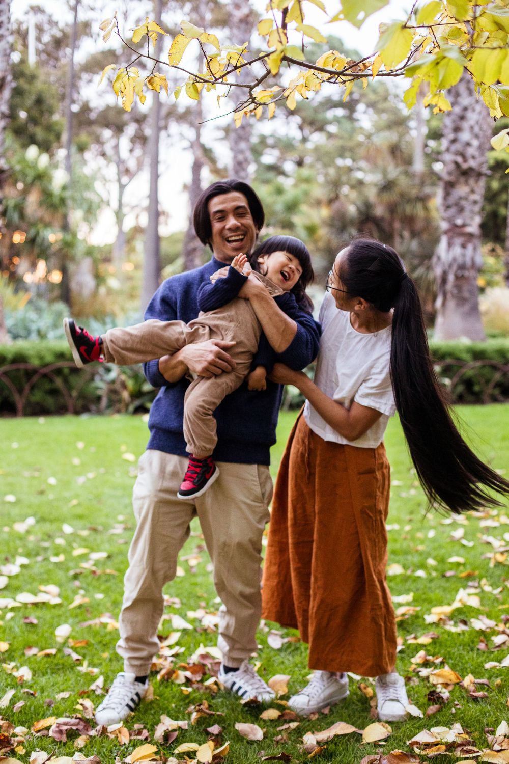 joyful laughs family photoshoot during autumn in melbourne