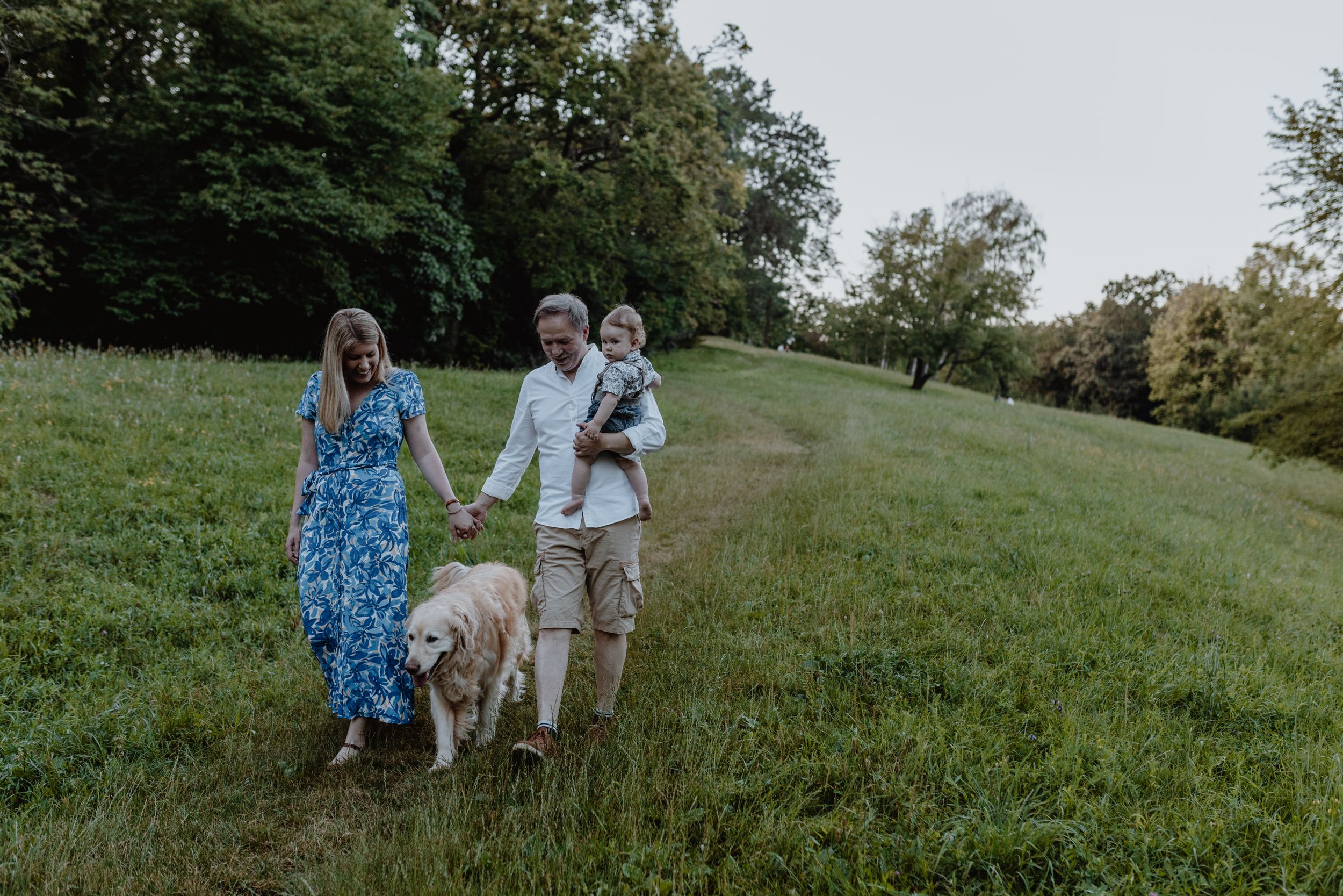 Family enjoying a walk together in Jelenovac, celebrating their child's first birthday.