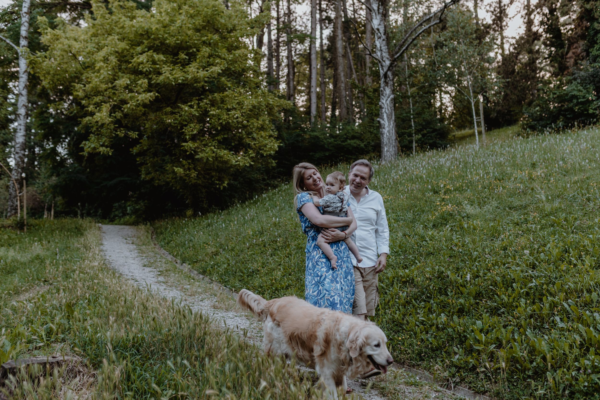 Candid family moment of a walk through nature, capturing the joy of exploring together.