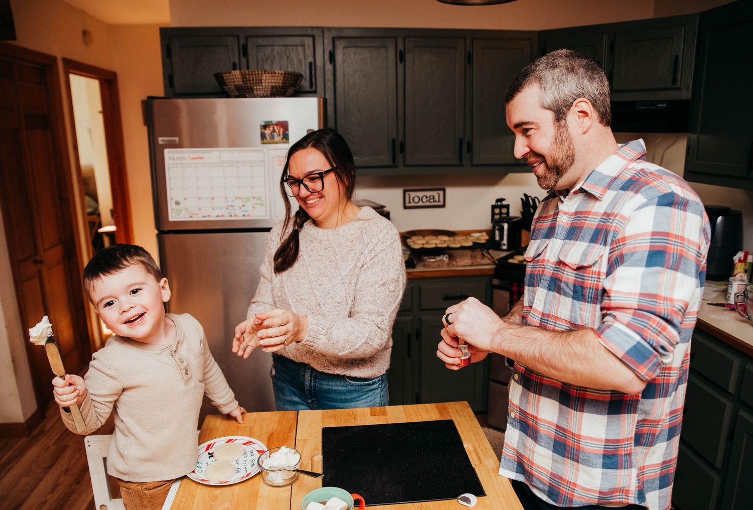 Family making Christmas cookies at home in New Gloucester Maine.