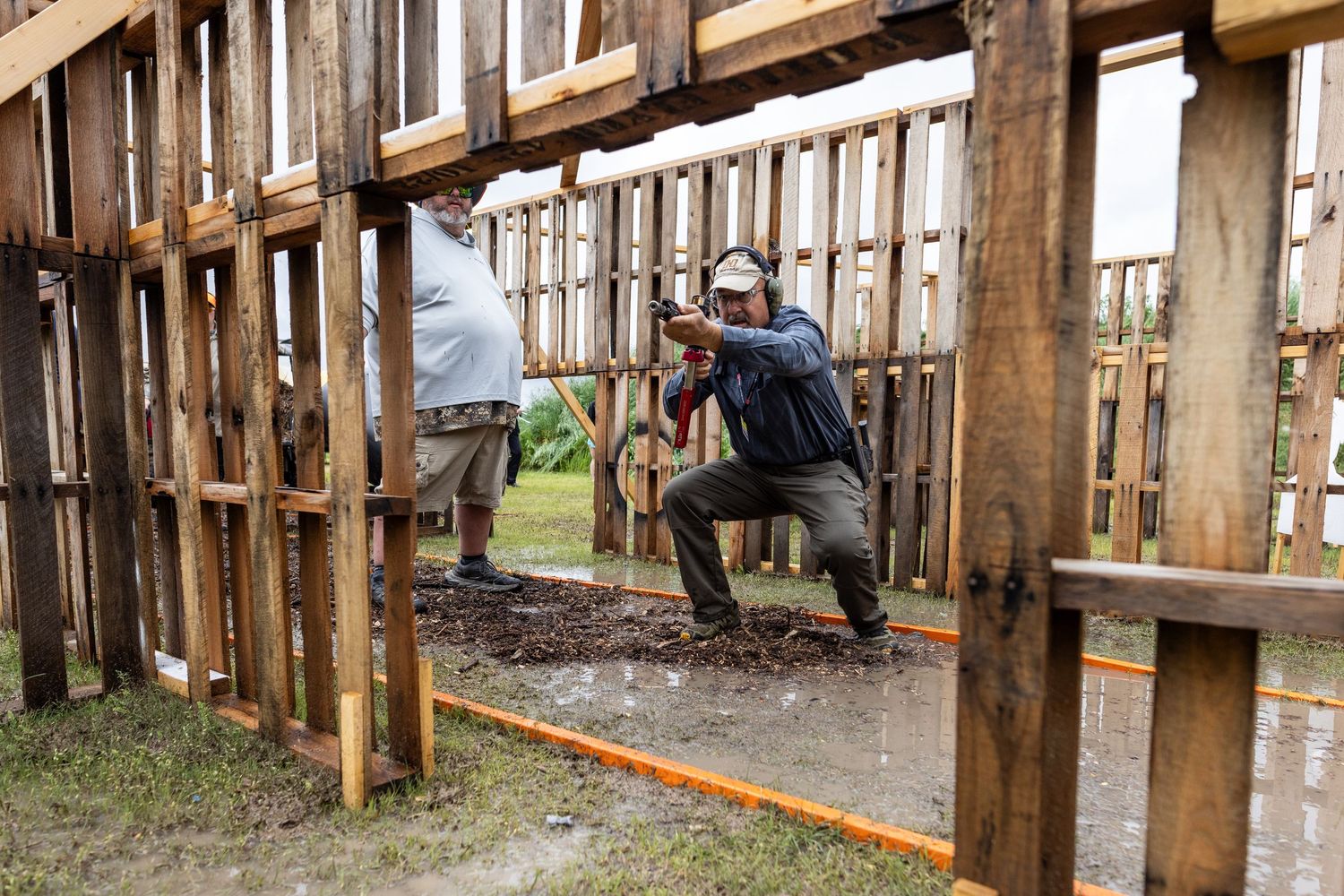 Construction or renovation work being done on wooden structural beams in a building.