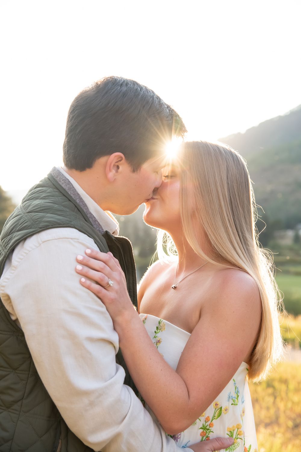 A romantic sunset moment captured in a series of intimate poses against golden light in Vail Colorado.
