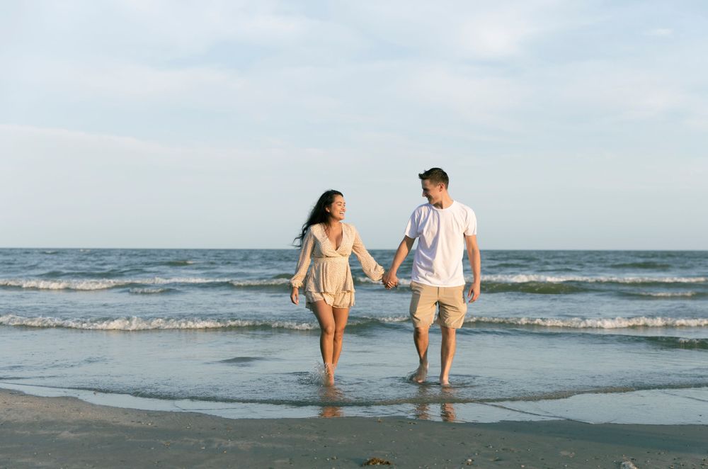 Beach couple summer photography, waves and curly hair