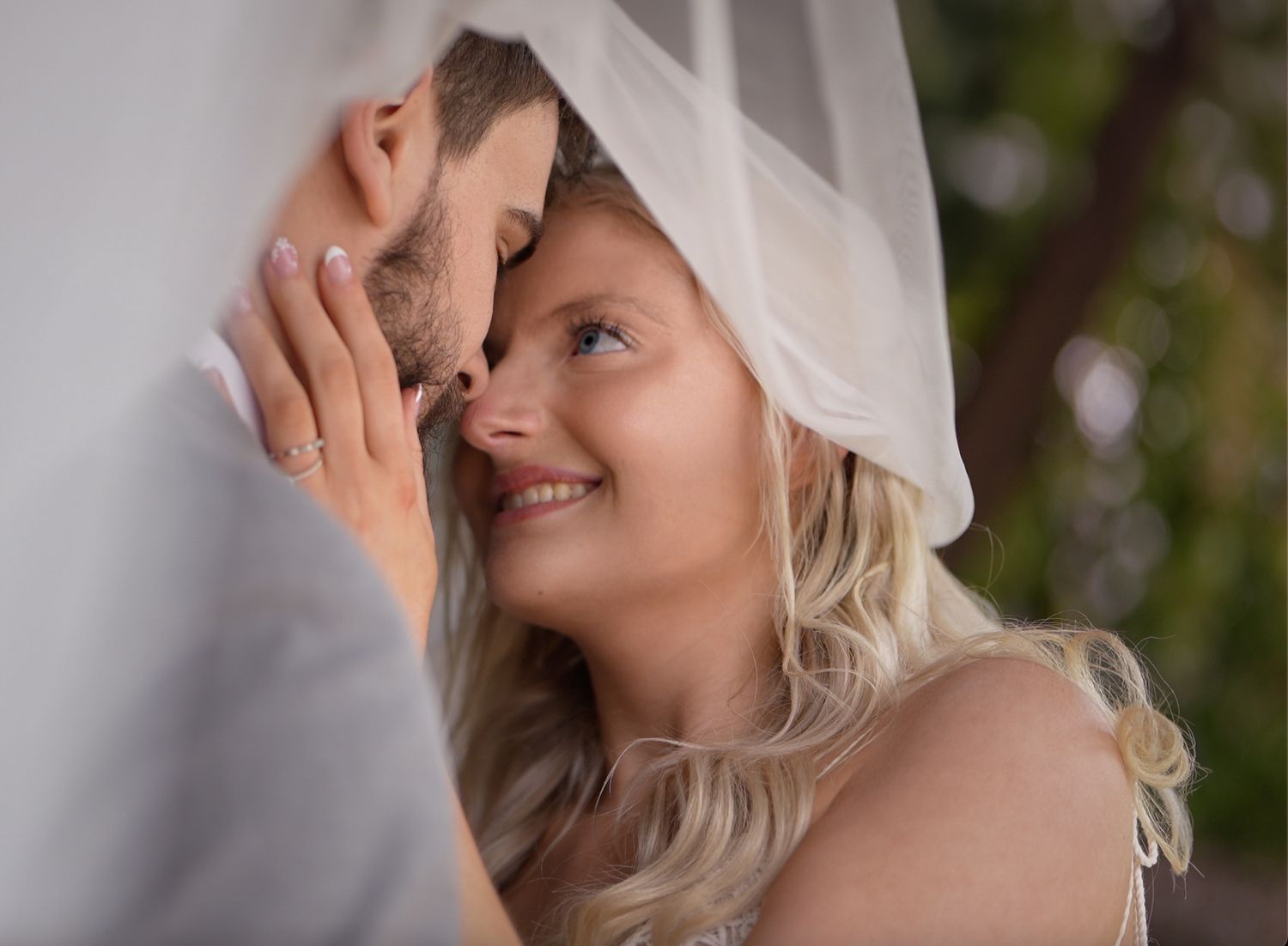 Intimate indoor wedding portraits showing tender moments between couple in ohio