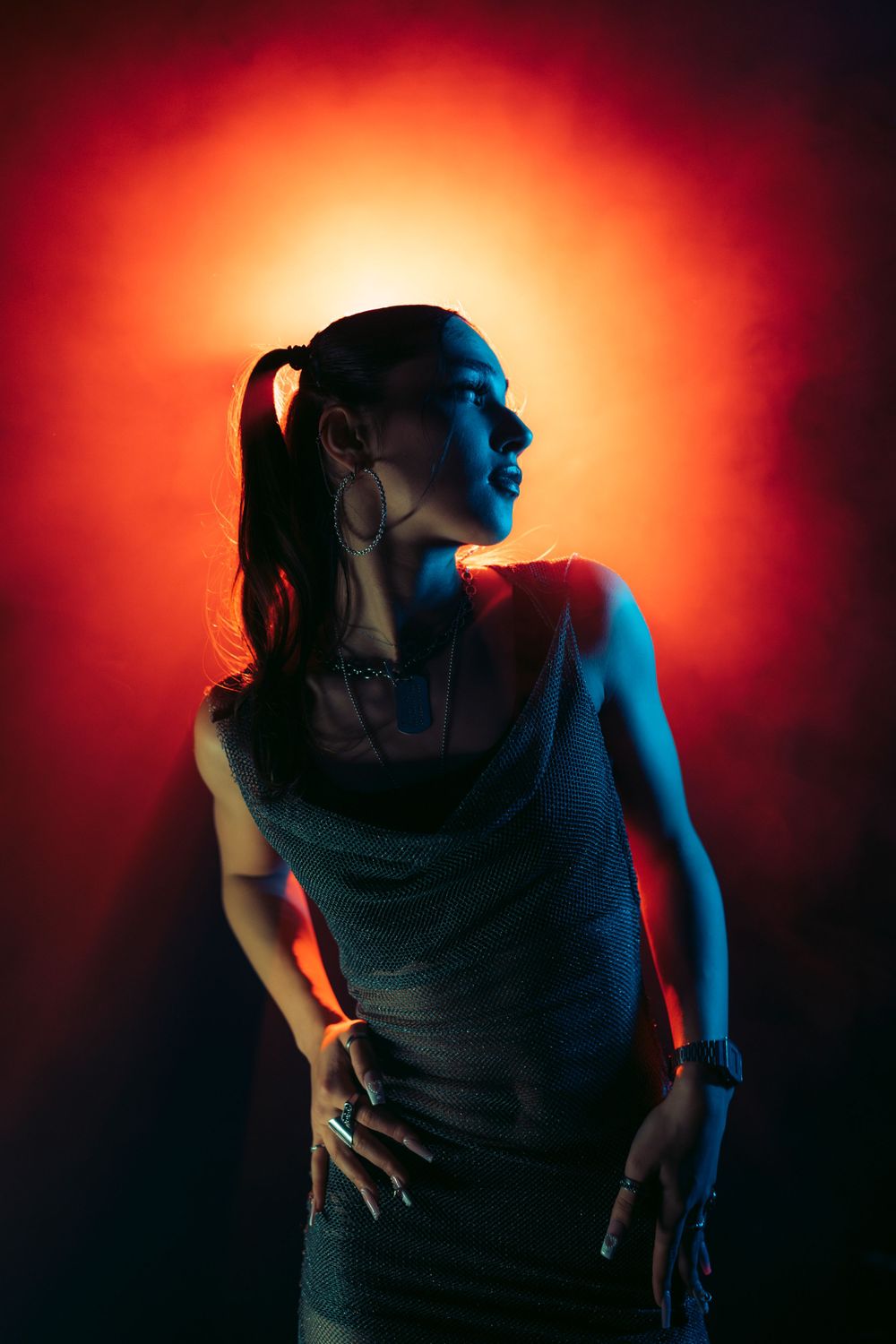 Artistic silhouette photo sequence showing dramatic lighting with red and blue tones.