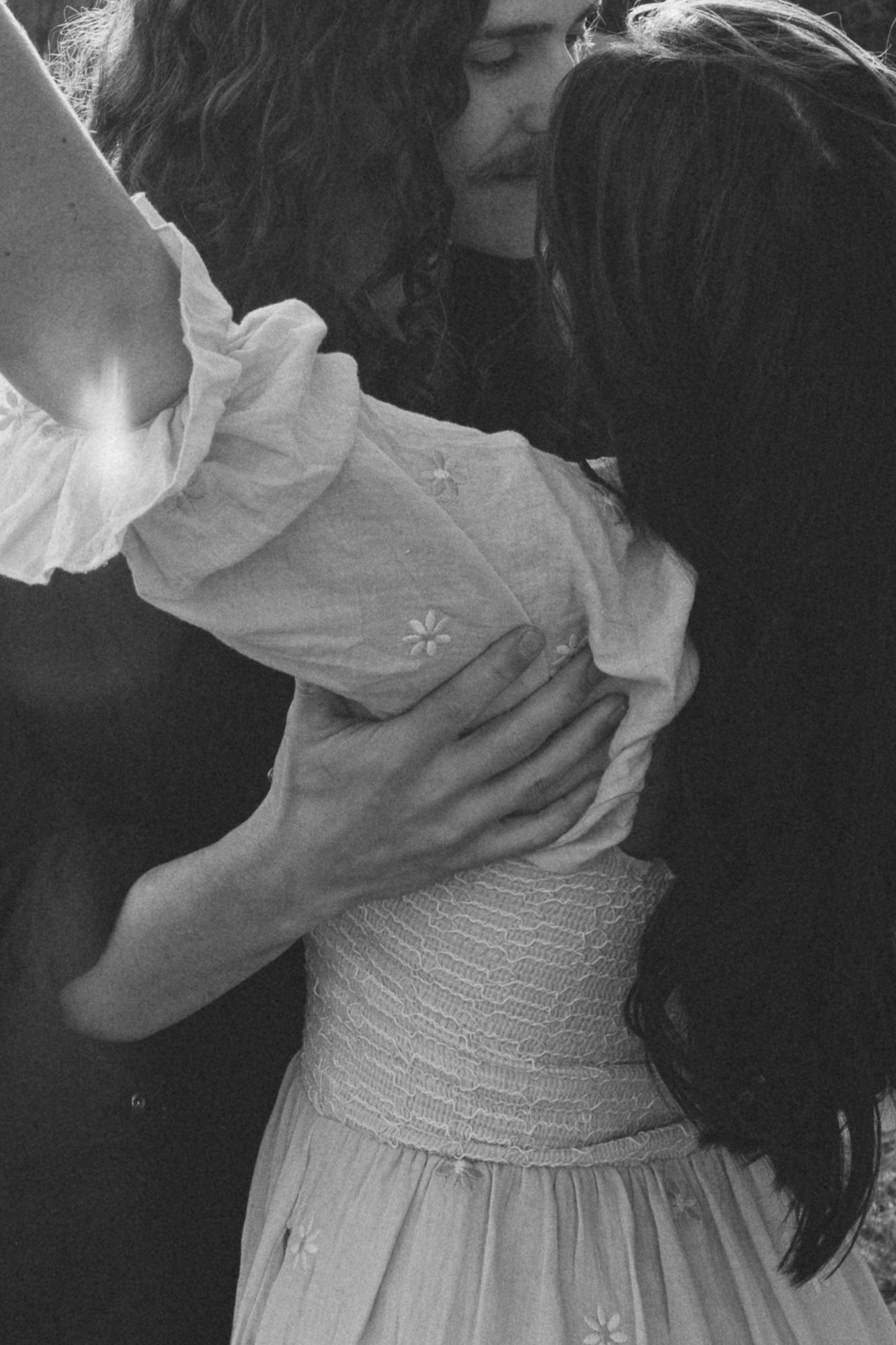 Close-up details of a light colored dress with delicate fabric details. Castle  Ladyhawke Wedding Photographer