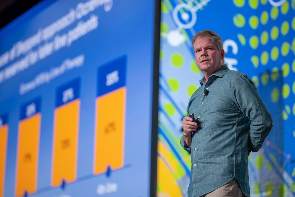 Corporate executive speaking at conference in Arizona