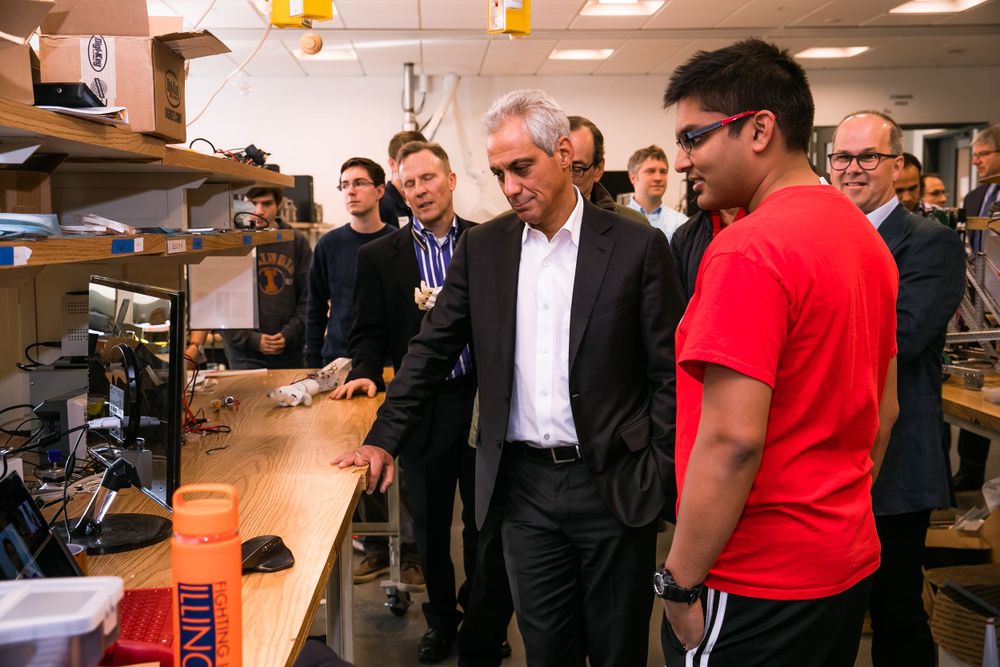 Mayor visits with college students during a visit