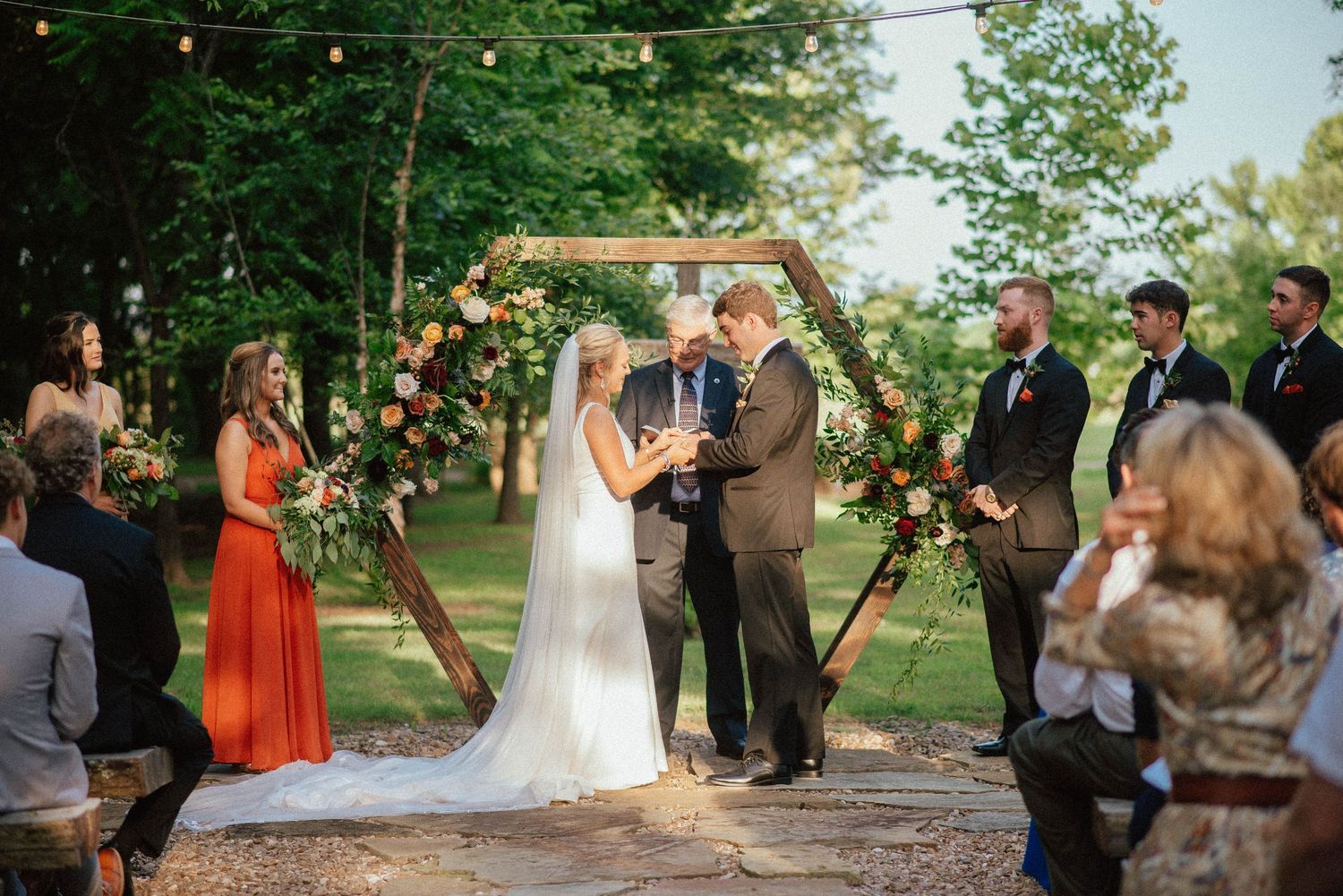 Wedding party celebration scenes in outdoor garden setting.
