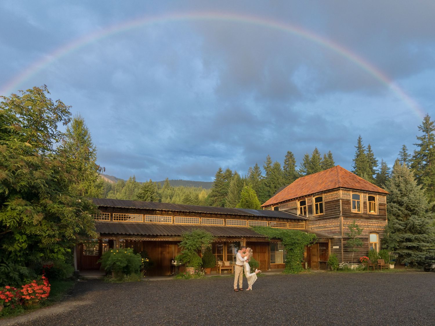 wedding couple under a rainbow photographed by life by jude photography / judith sumner