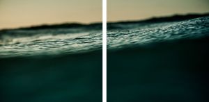 Underwater perspective of a dark teal ocean wave crest against a dusky sky in a diptych format.