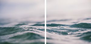 Close-up of calm ocean waves with soft blue-green water and a misty, blurred horizon in a diptych format.